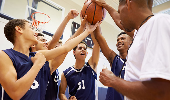 Boys at a residential boarding school playing basketball